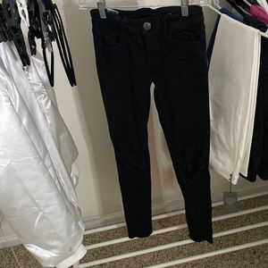 american eagle, low waisted, black, rips in the knees